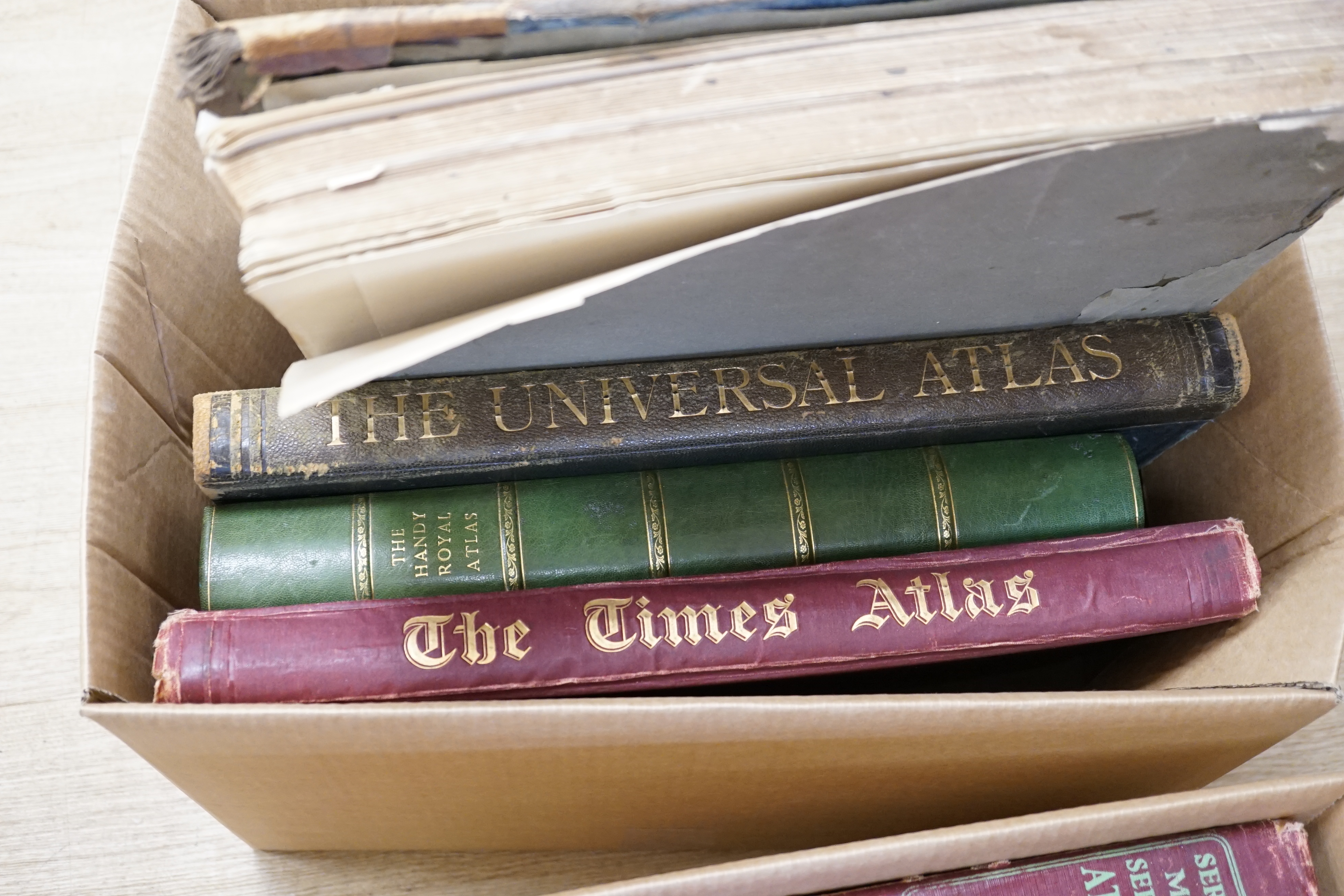Atlases - includes The Universal (1893), The Times (1895), Harmsworth's World (ca.1930); together with 7 others of the period, mostly with coloured maps, folio; sold with a folio architectural book